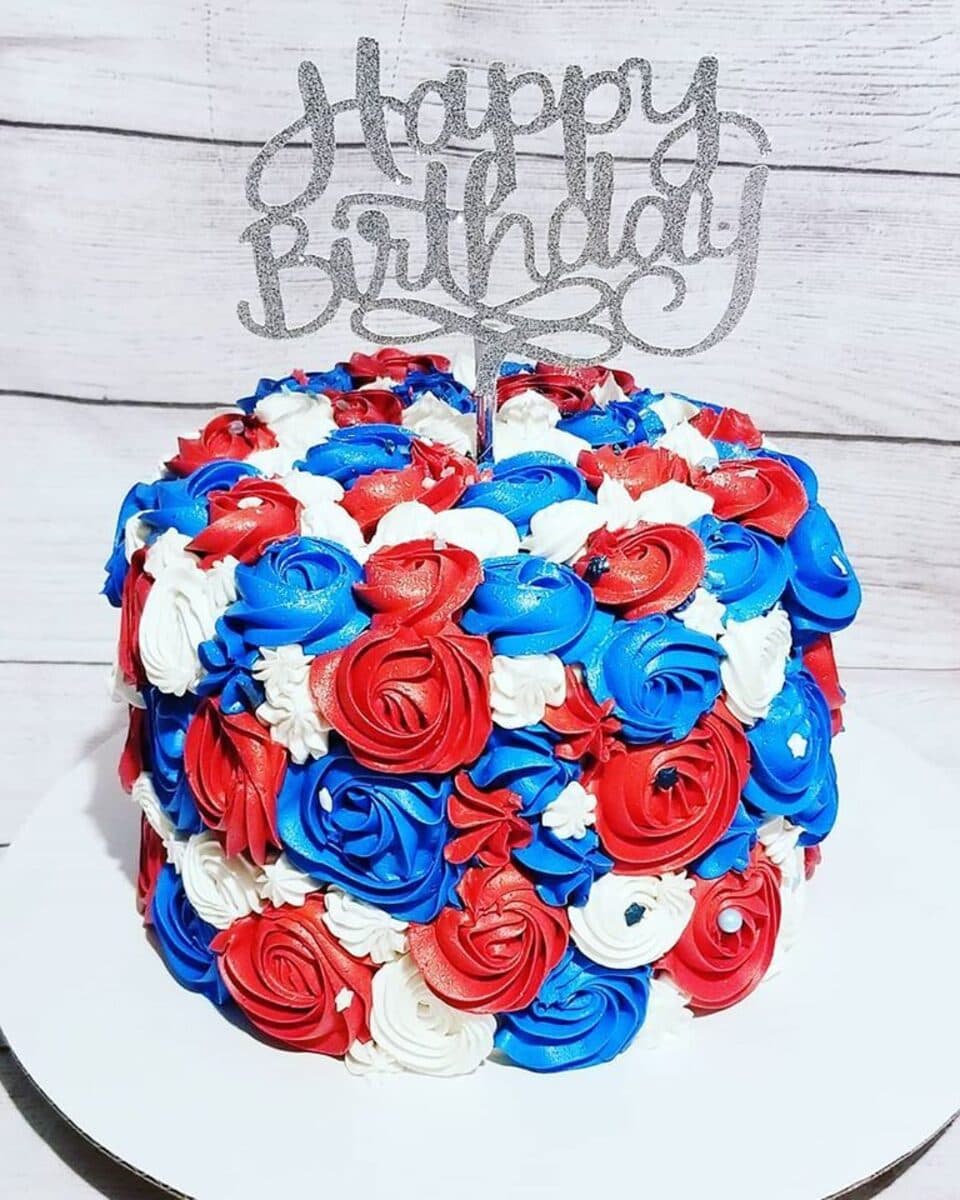 Red, white, and blue rosette buttercream cake