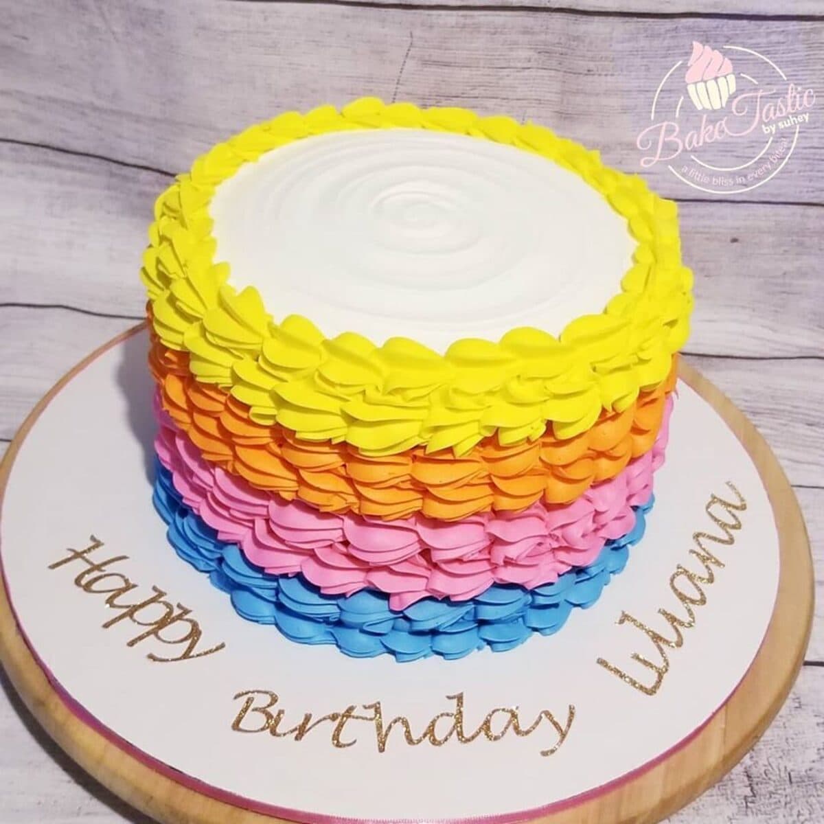 Rainbow buttercream layers birthday cake