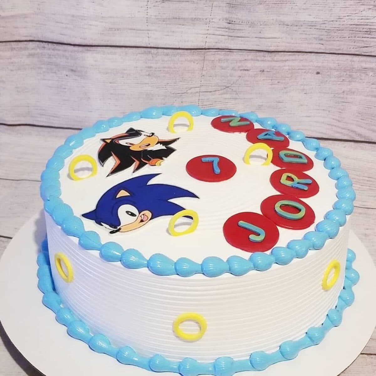 Blue video-game character birthday cake